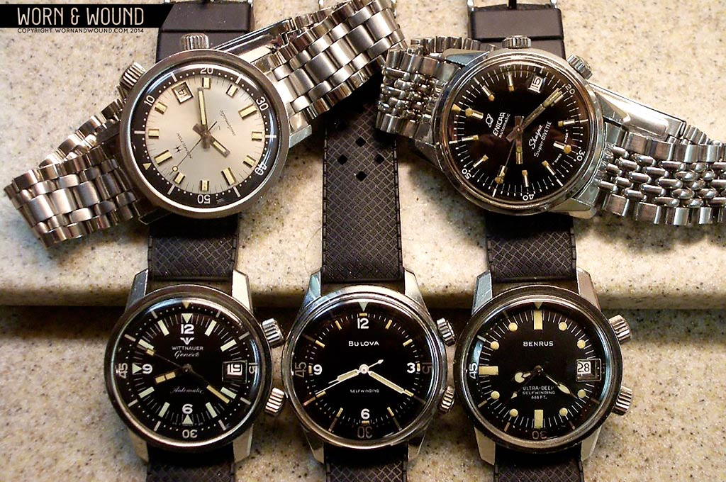Five vintage watches with two crowns and internal rotating bezels